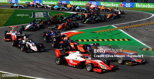 Oscar Piastri of Australia and Prema Racing and David Beckmann of Germany and Trident battle for position during race two of the Formula 3...