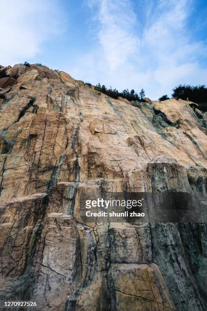 cliff boulder - cliff texture stock pictures, royalty-free photos & images