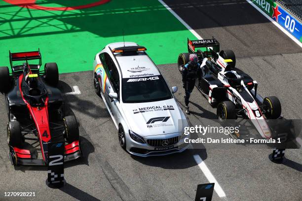 Race winner Dan Ticktum of Great Britain and DAMS arrives in parc ferme in the FIA Medical Car after stopping his car on track during the sprint race...