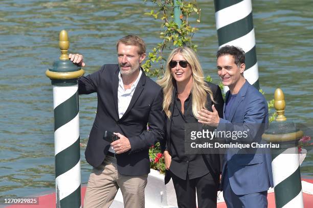 Lambert Wilson, Tiziana Rocca and Pedro Alonso is seen arriving at the Excelsior during the 77th Venice Film Festival on September 06, 2020 in...
