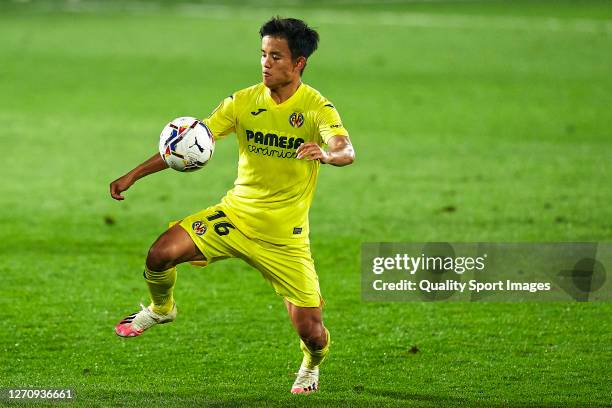 Takefusa Kubo of Villarreal CF with the ball during a Pre-Season friendly match between Villarreal CF and Levante UD at Villarreal Sports Center on...