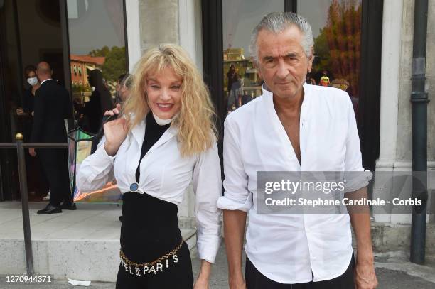 Arielle Dombasle and Bernard-Henri Lévy are seen arriving at the Excelsior during the 77th Venice Film Festival on September 06, 2020 in Venice,...