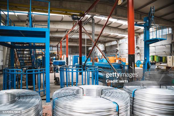 cable manufacturing machine in steel industry - cable spool stock pictures, royalty-free photos & images