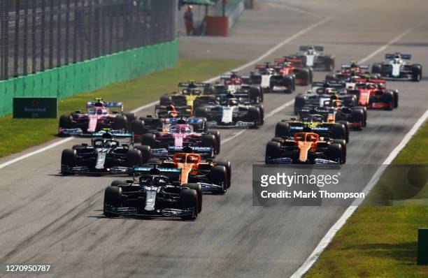 Lewis Hamilton of Great Britain driving the Mercedes AMG Petronas F1 Team Mercedes W11 leads the field at the start of the race during the F1 Grand...