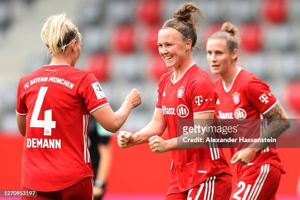 Kristin Demann of FC Bayern Muenchen celebrates scoring the 4th team goal with her team mate Marina Hegering during the Flyeralarm Frauen Bundesliga...