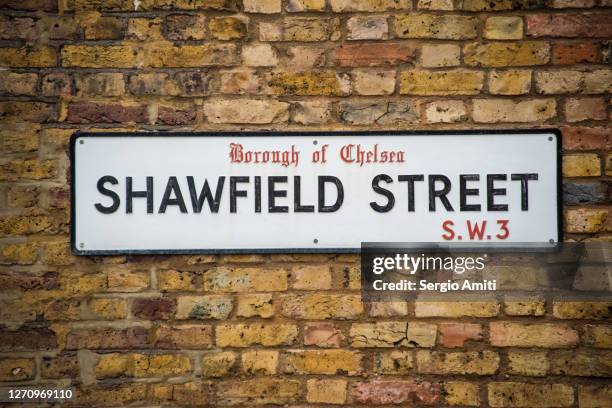 shawfield street sign on brick wall - traffic sign stock pictures, royalty-free photos & images