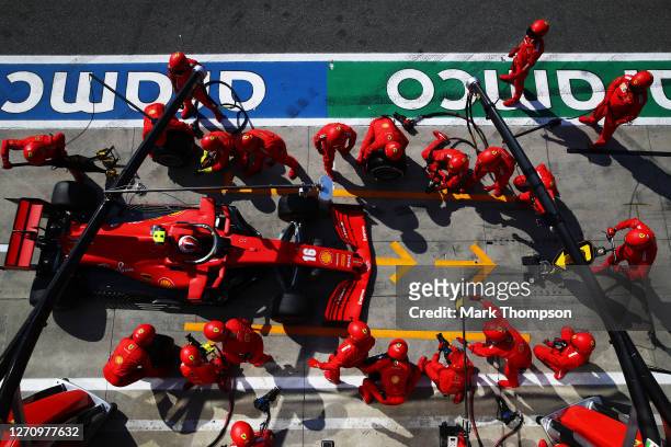 Charles Leclerc of Monaco driving the Scuderia Ferrari SF1000 comes in for a tyre change during the F1 Grand Prix of Italy at Autodromo di Monza on...
