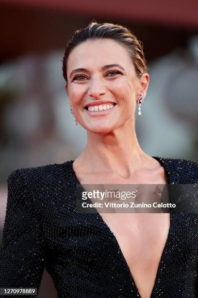 Festival Hostess Anna Foglietta walks the red carpet ahead of the movie "The World To Come" at the 77th Venice Film Festival on September 06, 2020 in...