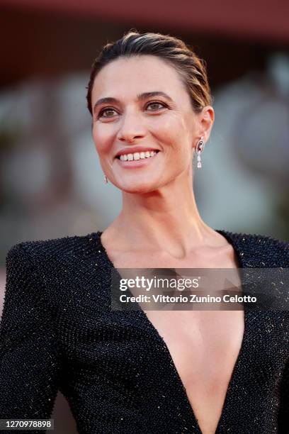 Festival Hostess Anna Foglietta walks the red carpet ahead of the movie "The World To Come" at the 77th Venice Film Festival on September 06, 2020 in...