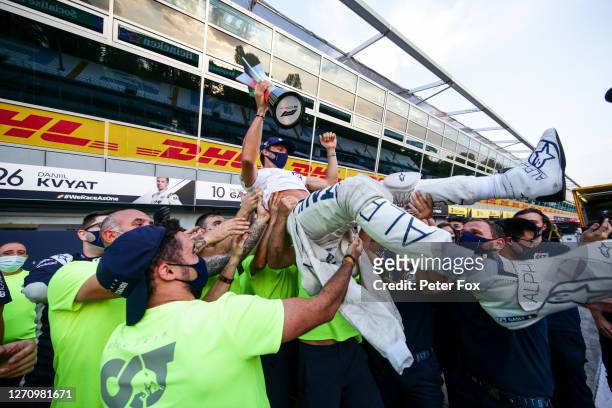 Pierre Gasly of Scuderia AlphaTauri and France celebrates with the team after winning the F1 Grand Prix of Italy at Autodromo di Monza on September...