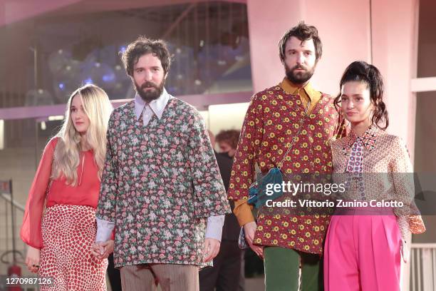 Damiano D'Innocenzo, Fabio D'Innocenzo and guests walk the red carpet ahead of the movie "The World To Come" at the 77th Venice Film Festival on...