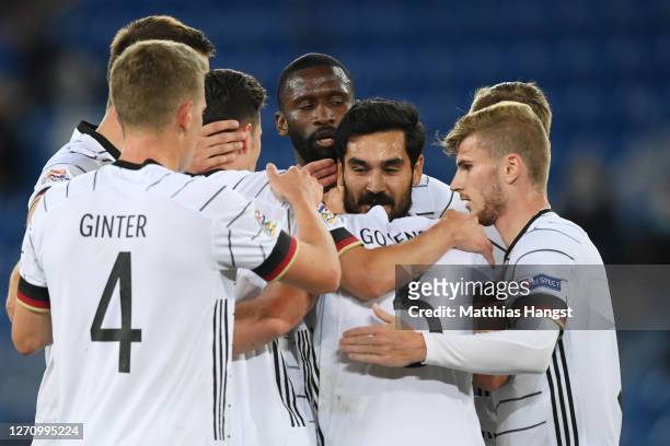 Ilkay Guendogan of Germany celebrates his team's first goal with teammates during the UEFA Nations League group stage match between Switzerland and...