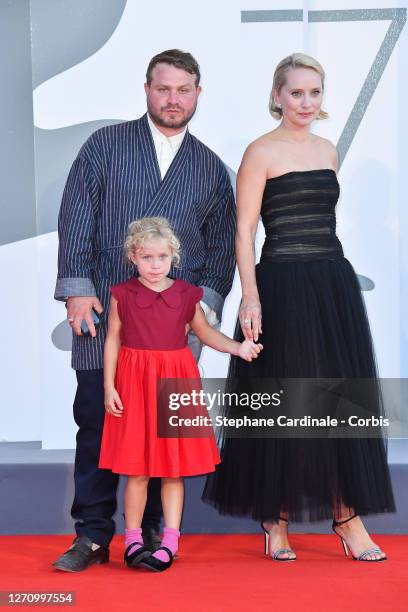 Brady Corbet, Adelaide James Fastvold Corbet and Director Mona Fastvold walk the red carpet ahead of the movie "The World To Come" at the 77th Venice...