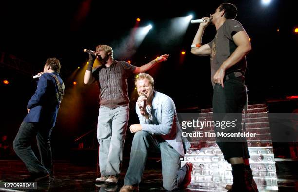 Howie Dorough, Nick Carter, Brian Littrell, and Kevin Richardson of Backstreet Boys perform during the band's "Never Gone" tour at Chronicle Pavilion...