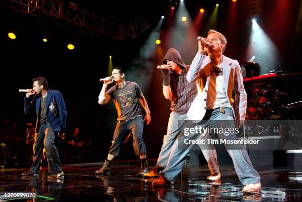 Howie Dorough, Kevin Richardson, Nick Carter, and Brian Littrell of Backstreet Boys perform during the band's "Never Gone" tour at Chronicle Pavilion...