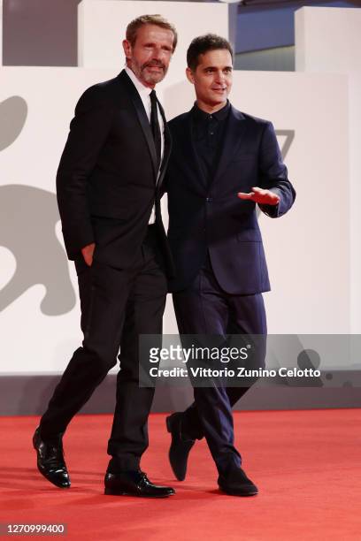 Lambert Wilson and Pedro Alonso walk the red carpet ahead of the movie "The World To Come" at the 77th Venice Film Festival on September 06, 2020 in...