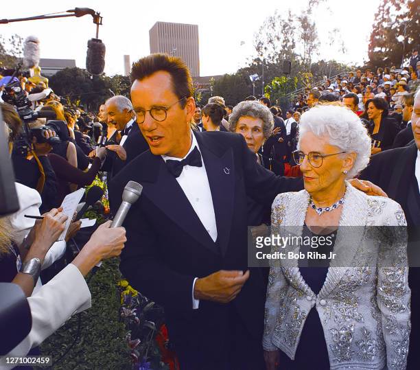 James Woods and guest during arrivals at Academy Awards Show, March 23, 1997 in Los Angeles, California.