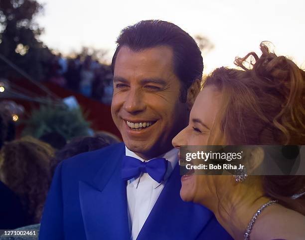 John Travolta and Kelly Preston during arrivals at Academy Awards Show, March 25,1996 in Los Angeles, California.