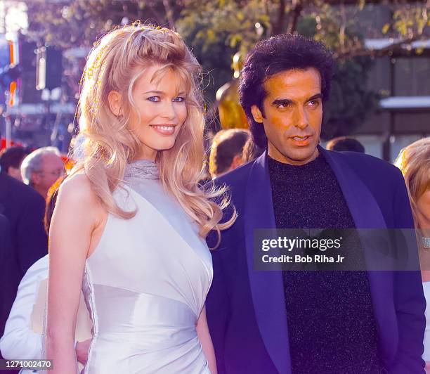 Claudia Schiffer and David Copperfield at Academy Awards Show, March 25,1996 in Los Angeles, California.