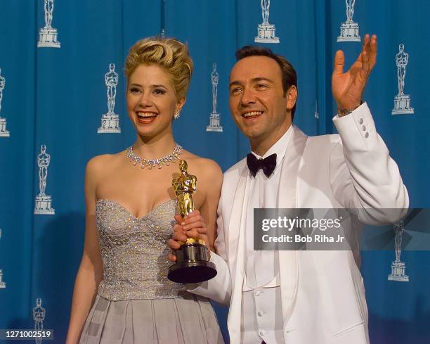 Oscar Winner Actor Kevin Spacey and Mira Sorvino backstage during 1996 Academy Awards Show, on March 25 in Los Angeles, California.