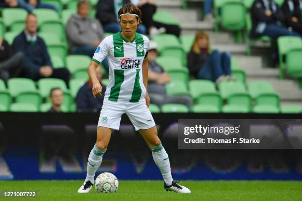 Ko Itakura of Groningen runs with the ball during the pre-season friendly match between FC Groningen and Arminia Bielefeld at Hitachi Capital...