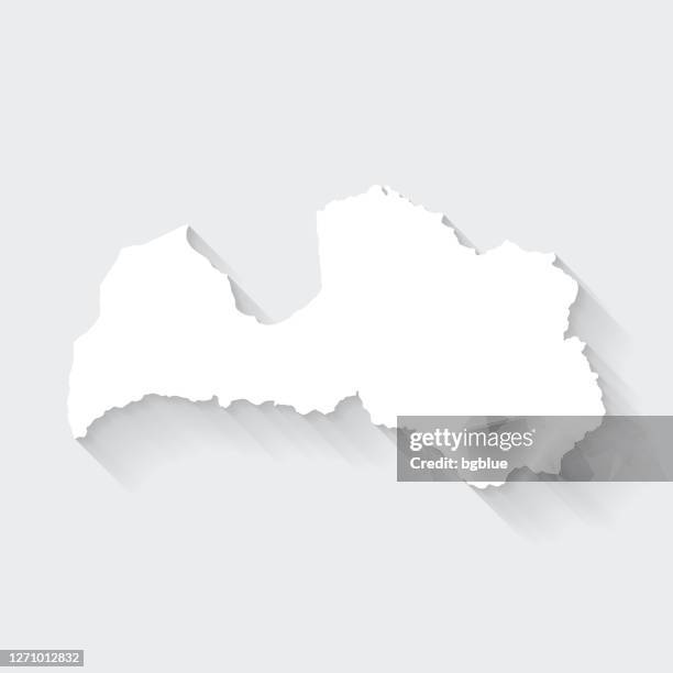 latvia map with long shadow on blank background - flat design - riga latvia stock illustrations