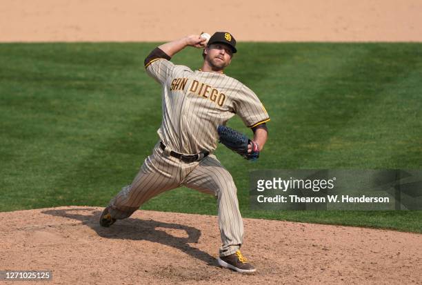 Trevor Rosenthal of the San Diego Padres pitches against the Oakland Athletics in the bottom of the ninth inning at RingCentral Coliseum on September...