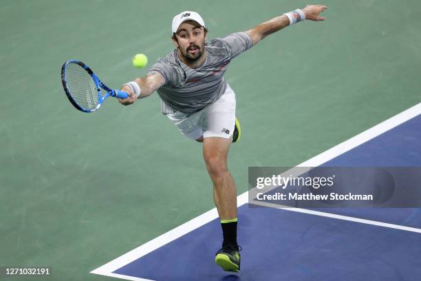 Jordan Thompson of Australia returns a volley during his Men’s Singles fourth round match against Borna Coric of Croatia on Day Seven of the 2020 US...