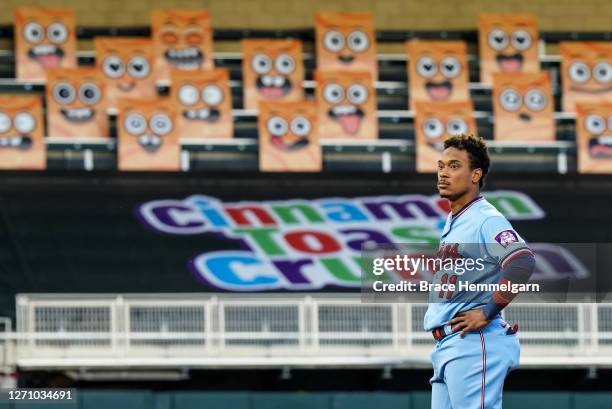Jorge Polanco of the Minnesota Twins looks on in front of the Cinnamon Toast Crunch Emoji fan section against the Chicago White Sox on September 2,...
