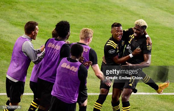 Gyasi Zardes celebrates his goal in the second half with Luis Diaz of Columbus Crew and teammates during their game against FC Cincinnati at MAPFRE...