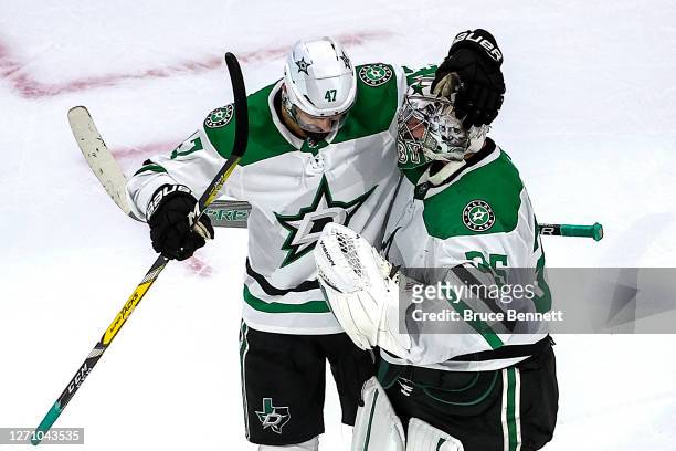 Anton Khudobin of the Dallas Stars is congratulated by Alexander Radulov after his 1-0 shut out victory against the Vegas Golden Knights in Game One...