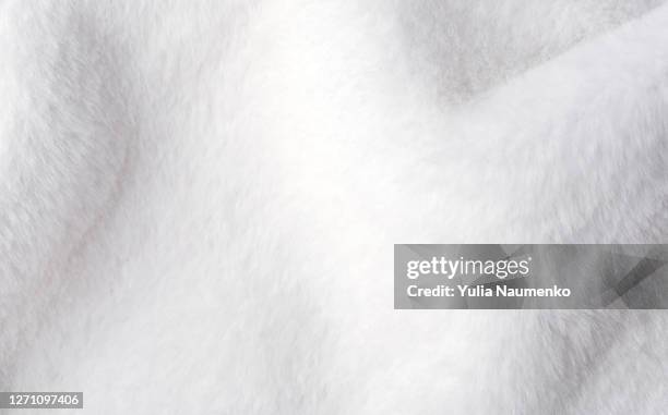 white faux fur texture as background. - fluffy stock pictures, royalty-free photos & images