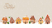 Christmas greeting card with cute gingerbread houses