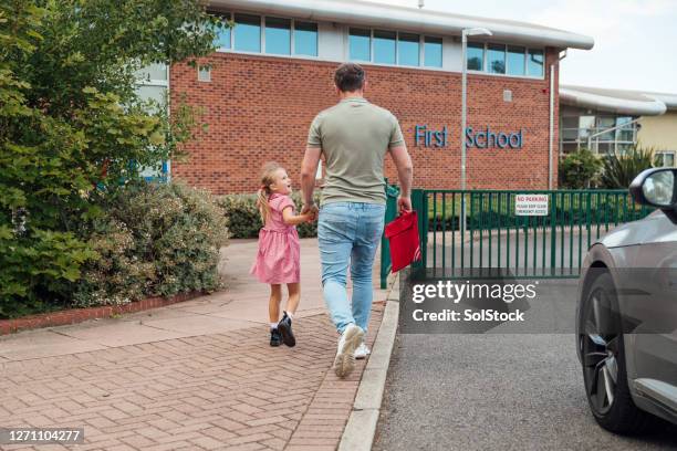 dropping off my daughter - holding hands in car stock pictures, royalty-free photos & images