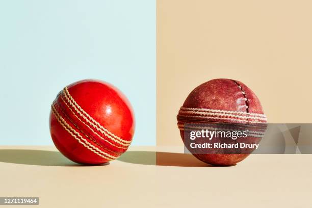 composite image of old and new cricket balls - cricket ball stock pictures, royalty-free photos & images