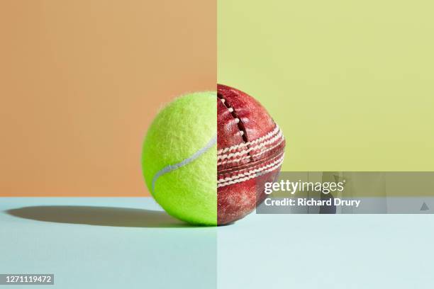 composite image of a new tennis ball and old cricket ball - two objects joined stock pictures, royalty-free photos & images