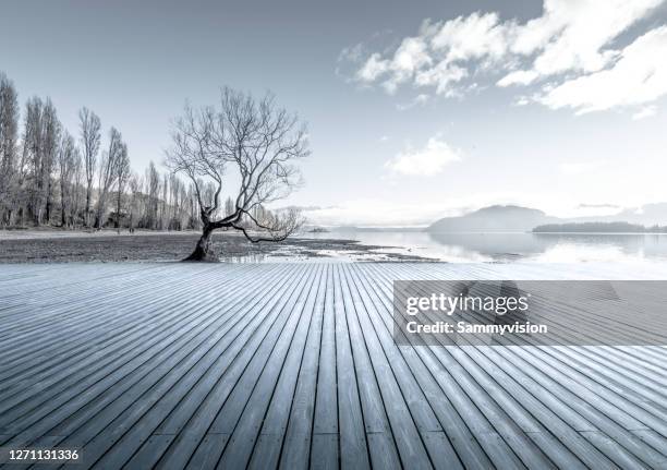 parking lot against snowcapped mountain during sunrise - parking deck stock pictures, royalty-free photos & images