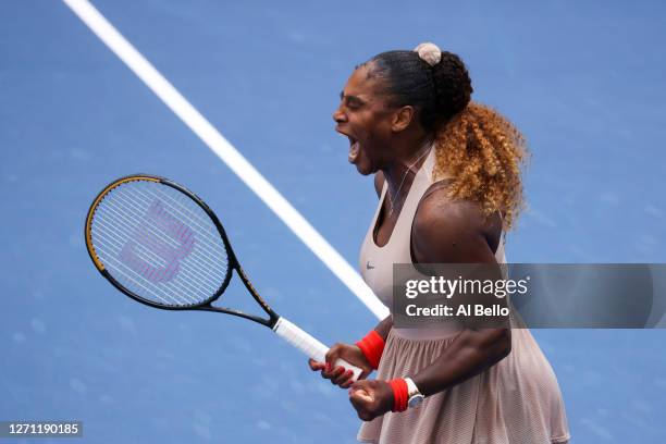 Serena Williams of the United States celebrates winning match point in the third set during her Women's Singles fourth round match against Maria...