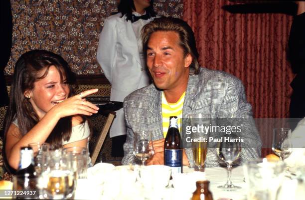 Don Johnson at the Aspen Tennis Festival relaxes with a beer after playing tennis on August 23, 1987 at Aspen, Colorado