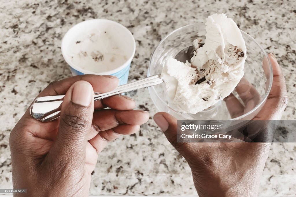 Woman Serves Ice Cream For One