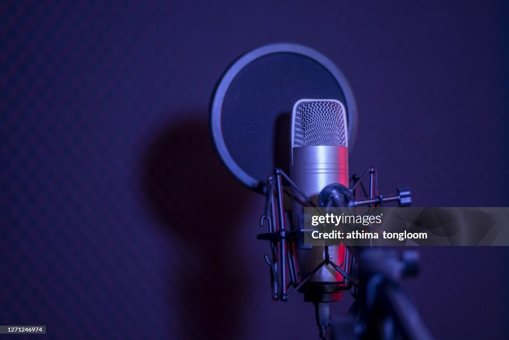 Microphone in radio station broadcasting studio.