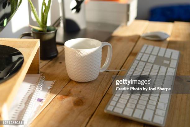 working from home on a desk made of pallets - makeshift desk stock pictures, royalty-free photos & images