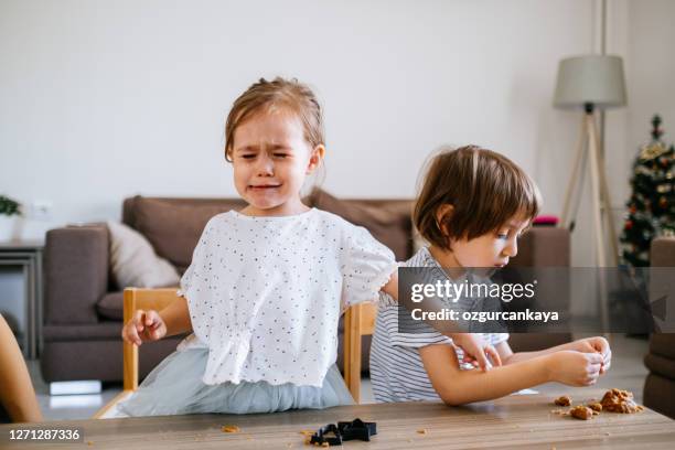 happy family funny kids bake cookies in kitchen - jealous sister stock pictures, royalty-free photos & images