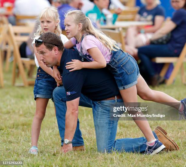 Peter Phillips and daughters Isla Phillips and Savannah Phillips attend day 1 of the 2019 Festival of British Eventing at Gatcombe Park on August 2,...