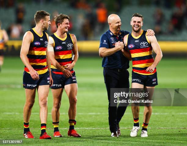 Adelaide Crows Senior Coach Matthew Nicks celebrates with Brad Crouch of the Crows during the round 16 AFL match between the Adelaide Crows and the...