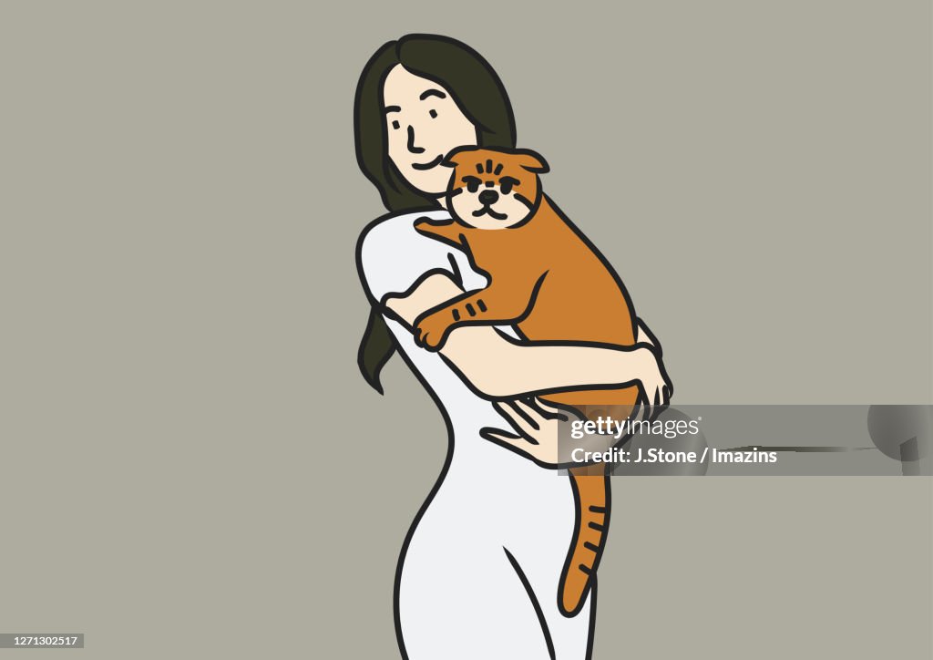 A Woman Holding a Cat