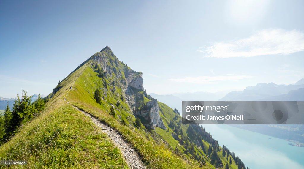 Hiking path along alpine ridge line, Augstmatthorn, Switzerland