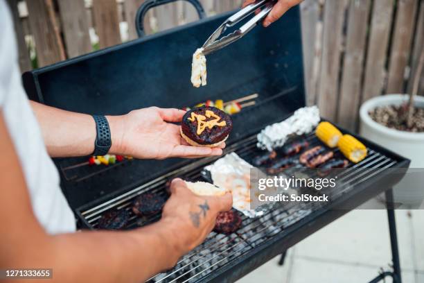 trying a veggie burger - grilled halloumi stock pictures, royalty-free photos & images