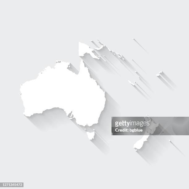 oceania map with long shadow on blank background - flat design - australia map stock illustrations