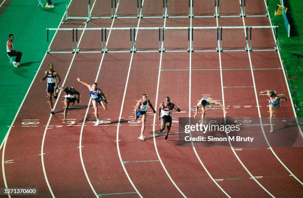 Allen Johnson of the United States of America winning the men's 110m hurdle final followed by Colin Jackson of Great Britain and Florian Schwarthoff...